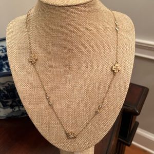 Gold layering necklace with crosses